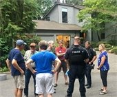 Group of neighbors talking with LFPPD officer during 2021 National Night Out event
